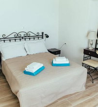 Day One Fira Mansion